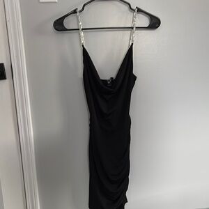 Elegant Black Dress with Embellished Straps